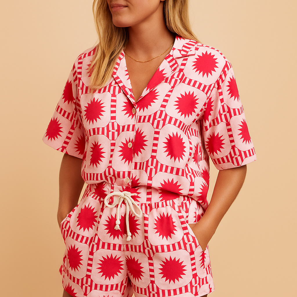 Women’s floral summer set with short-sleeve blouse and elastic waistband shorts, available in beige, blue, light green, and yellow, ideal for warm weather