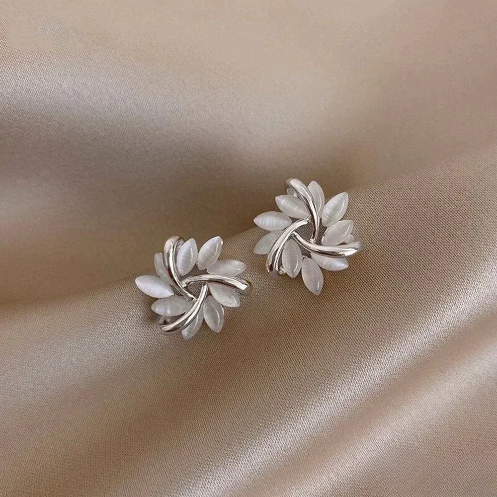Luxurious Gold Earrings with Beautiful Opal Designs