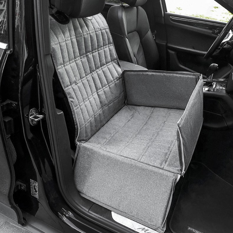 Cozy padded dog car seat basket for safe travel, features secure straps, plush padding, stylish design, ideal for pets.