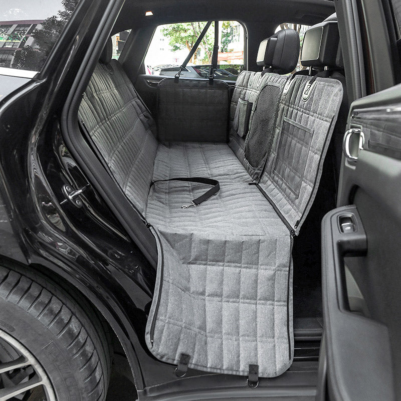 "Waterproof dog car seat cover with mesh window, black, universal fit, breathable and durable for comfortable pet travel."