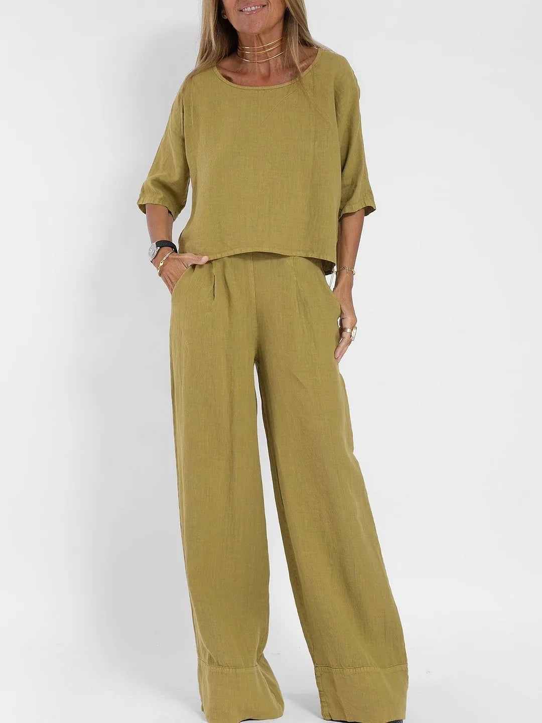 Women's casual outfit set with chic top and matching pants, light formal style, ideal for versatile and stylish wear.