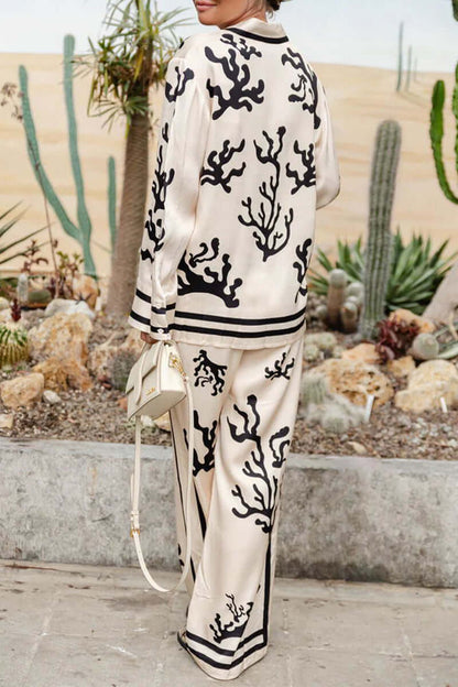Trendy Pattern Blouse & Flared Trousers