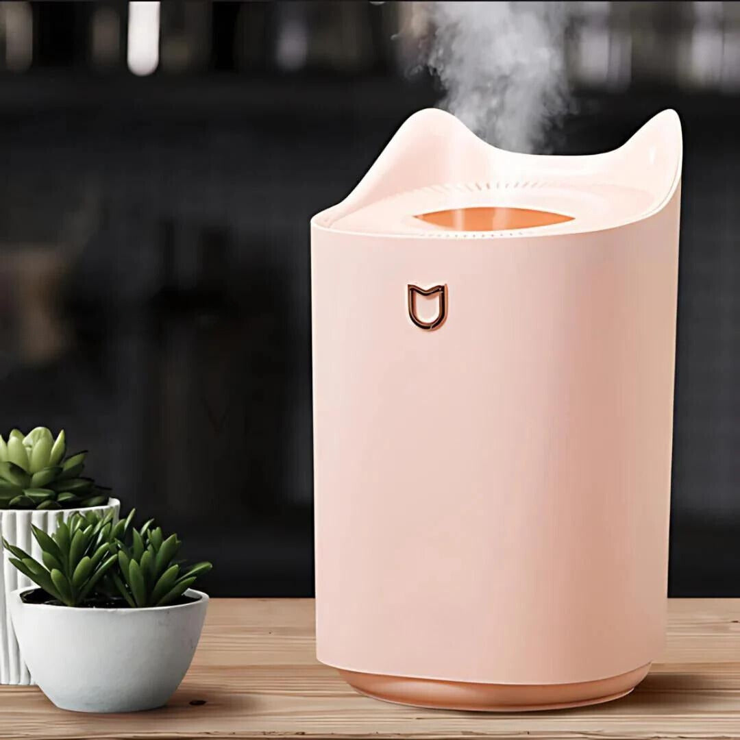 "3000ml ultrasonic humidifier with mist technology in sleek pink design, improves air quality, alleviates respiratory issues.