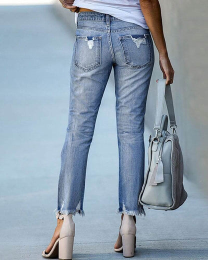 Distressed Fashionable Women's Blue Jeans