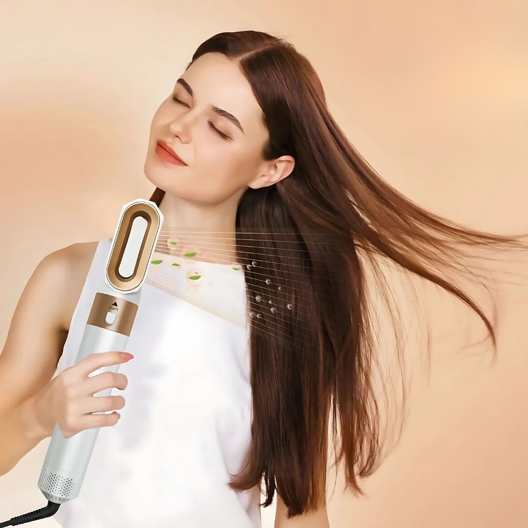 "5-in-1 hair styler with air tech, five attachments, sleek silver design for curling, drying, smoothing, volumizing."