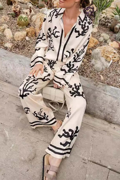 Trendy Pattern Blouse & Flared Trousers