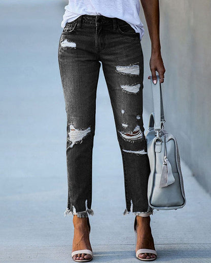 Distressed Fashionable Women's Blue Jeans