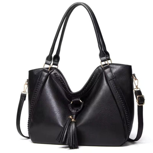 Classic Leather Handbag with Chic Tassel Trim - Luxivelle