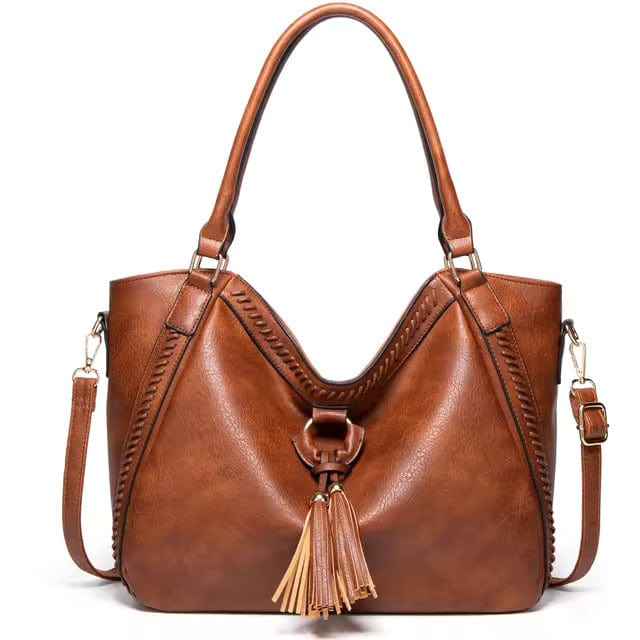 Classic Leather Handbag with Chic Tassel Trim
