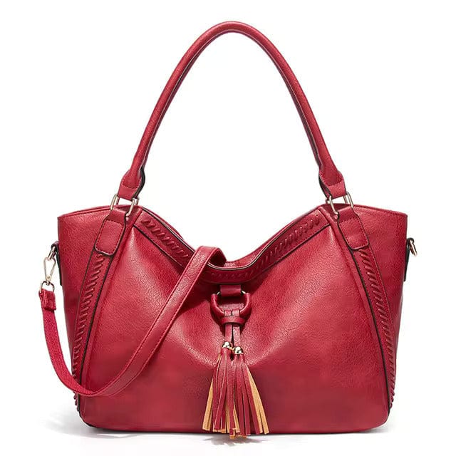 Classic Leather Handbag with Chic Tassel Trim