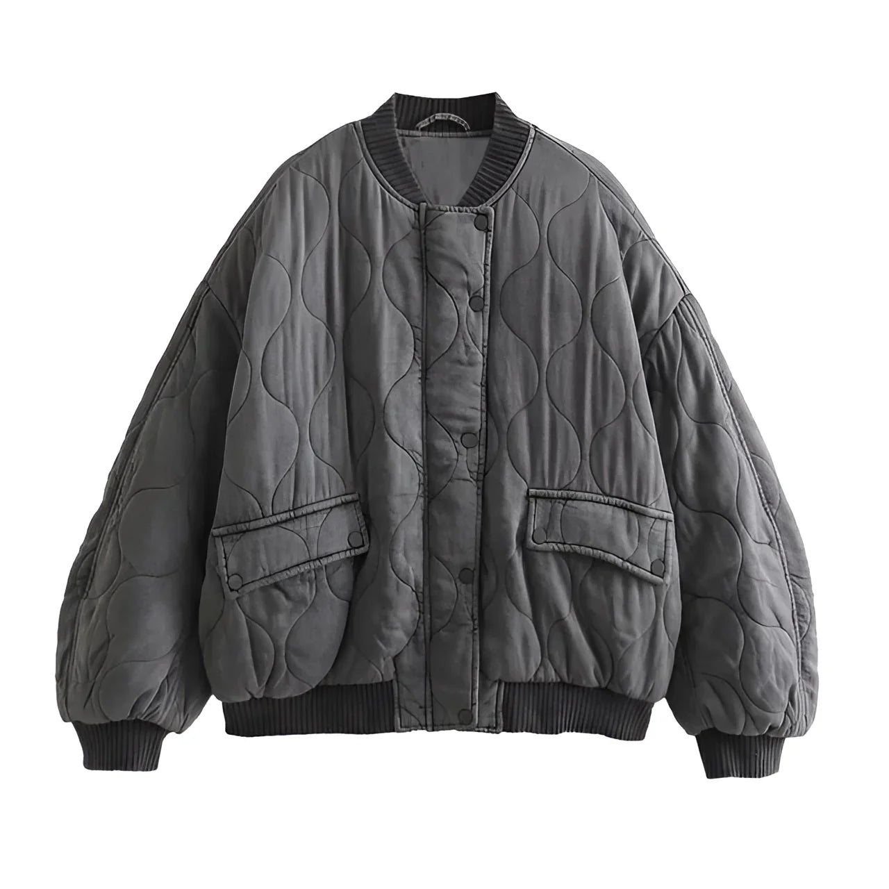 Women's charcoal grey quilted oversized bomber jacket with ribbed cuffs and zip-up front, featuring a collar and long sleeves.