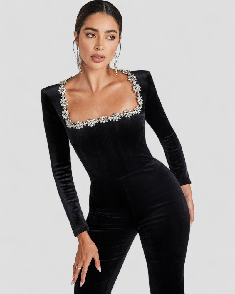 Black Jumpsuit with long sleeves and floral detail 2