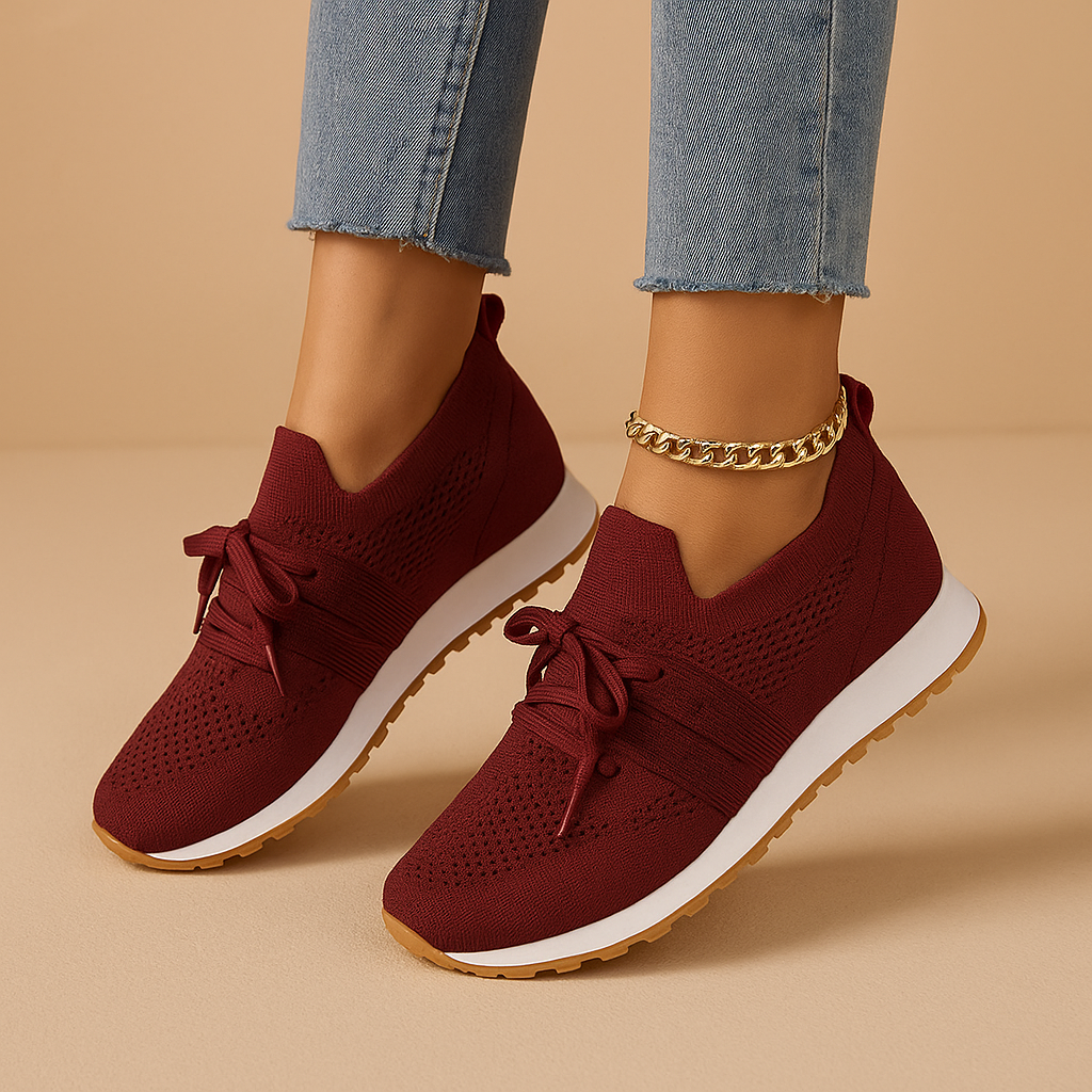 Women’s lace-up shoes with breathable mesh, cushioned rubber sole, and rounded toe in black, grey, brown, and red, ideal for daily comfort.