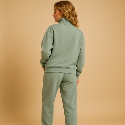 Women’s casual jogger set with half-zip sweatshirt and loose-fit trousers in pink, green, and blue, ideal for lounging or sporty days