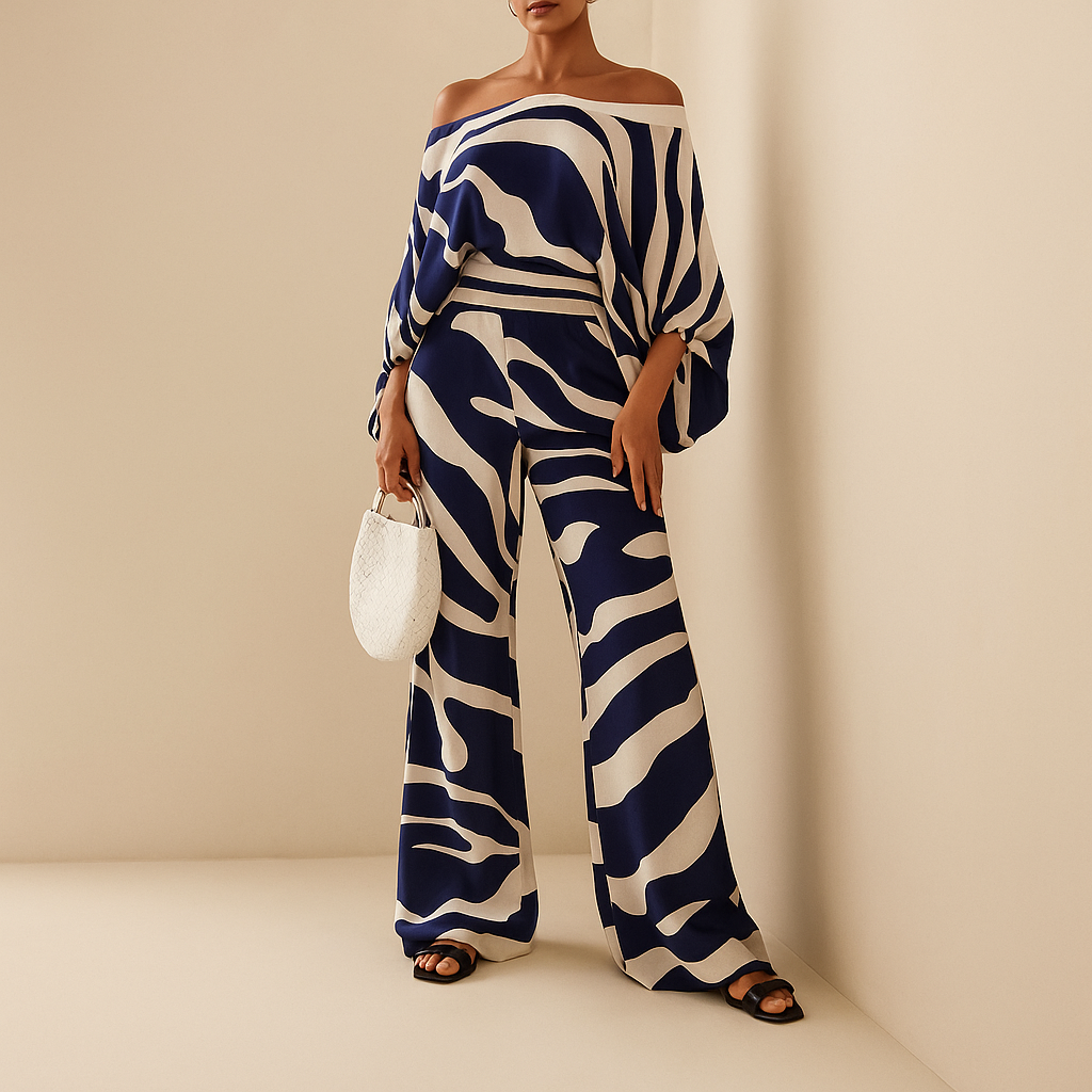 Women’s summer outfit with off-shoulder top and wide-leg trousers in soft colours and prints, ideal for warm days, dinners, or office wear