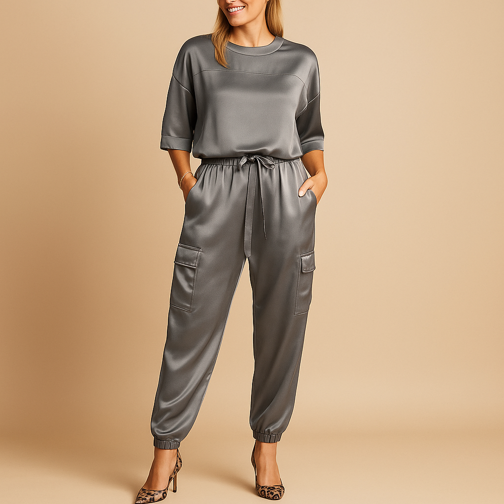 Two-piece women’s satin outfit with half-sleeve top and straight trousers in black, champagne, olive green, and dark red, perfect for autumn or elegant loungewear