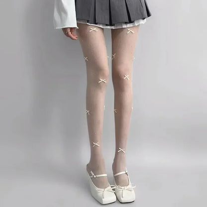 Simone | Playful tights with bow pattern