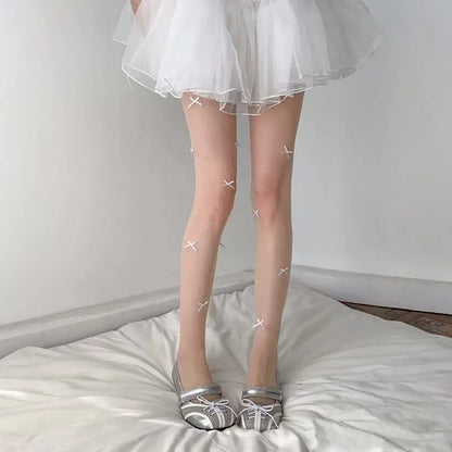 Simone | Playful tights with bow pattern