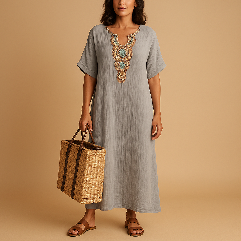 Women’s kaftan dress with airy fabric and flowing silhouette, perfect for summer beach outings or elegant occasions.