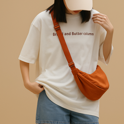 Anti-theft dumpling crossbody bag for women with ergonomic design, zippered closures, and secure strap for stylish daily wear and travel.