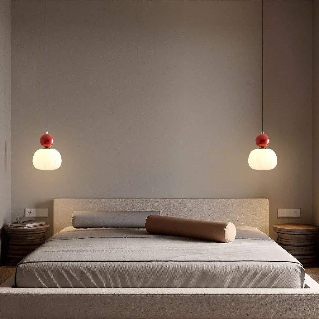 "Art Deco Cream Pendant Light with Bauhaus design, features high-quality metal frame and warm glow for elegant home lighting.
