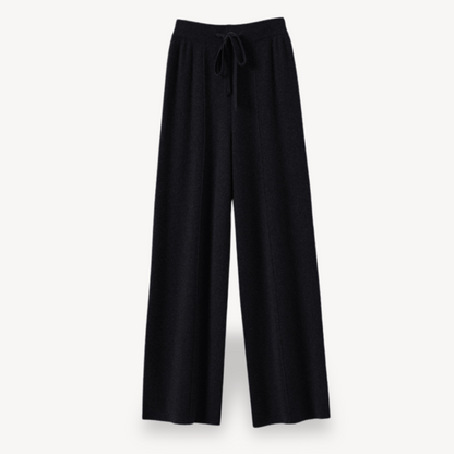 Beige cashmere wide-leg pants for women, offering comfort and style with a relaxed fit and drawstring adjustable waist.