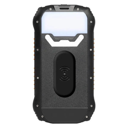"Black and orange portable solar power bank for outdoor use, showcasing sleek design and multiple charging ports."