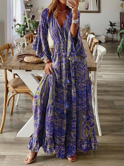Bohemian paisley maxi dress with flared sleeves, vibrant print, flowy design, captures chic style for women's summer wear.
