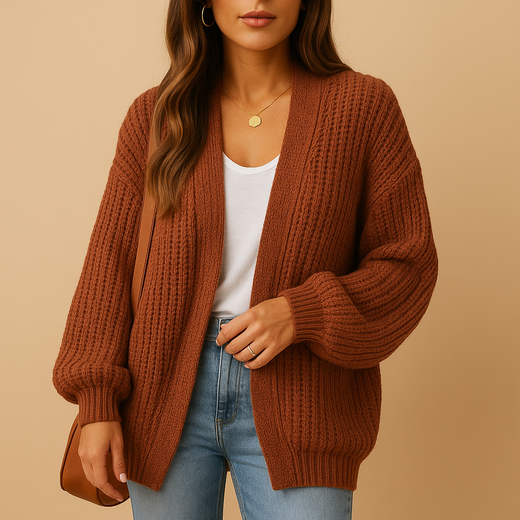 Loose-fit knitted cardigan for women with soft texture and relaxed design, perfect for spring and autumn layering or cozy winter days.