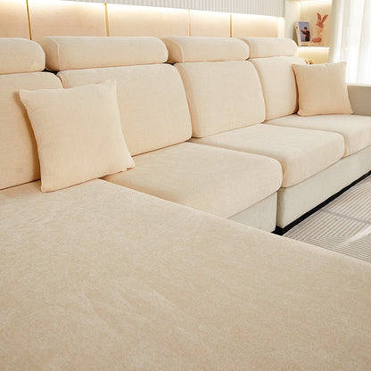 "Chenille sectional sofa cover in smoke color, fits snugly on sectional sofas to protect against wear, spills, and stains."