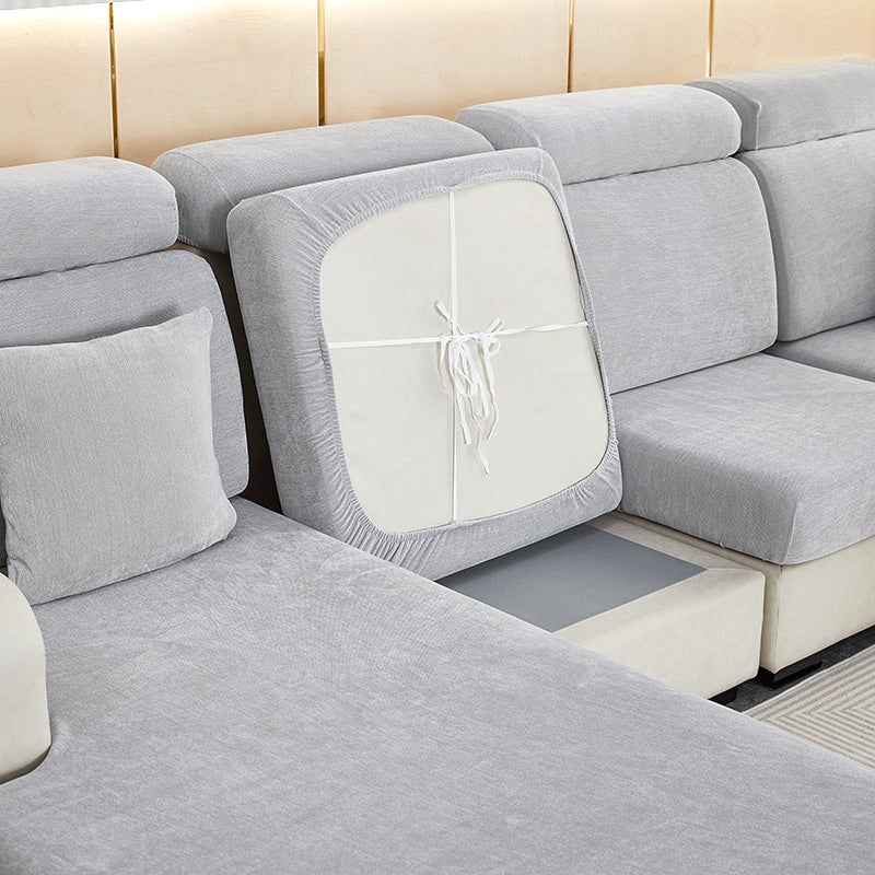 "Chenille sectional sofa cover in smoke color, fits snugly on sectional sofas to protect against wear, spills, and stains."