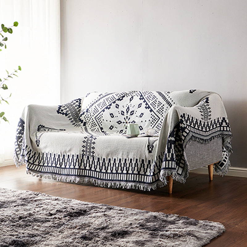 "Colorful bohemian tassel knitted sofa throw, featuring bright patterns and ethnic tassel details for vibrant home decor."