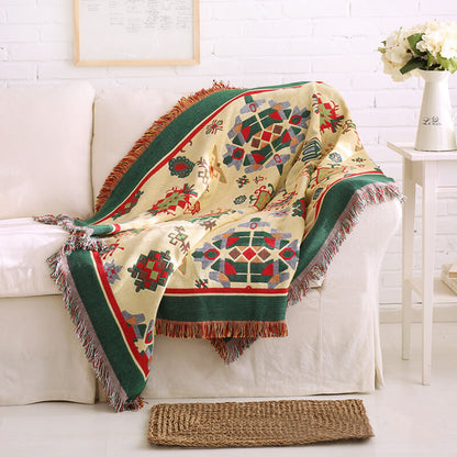 "Colorful bohemian tassel knitted sofa throw, featuring bright patterns and ethnic tassel details for vibrant home decor."