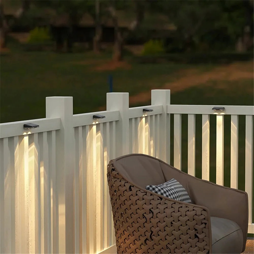 Colorful solar fence lights, 7-Color LED, sleek design, bright outdoor wall lights for gardens, patios, IP65 waterproof.