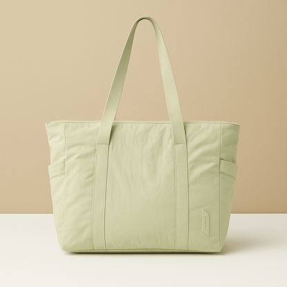 Stylish waterproof commuter tote bag for women with multiple compartments, perfect for work, gym, and daily essentials.