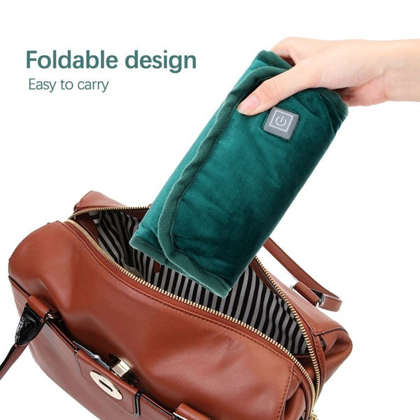 "Compact 2-in-1 Electric Hand Warmer with USB Charging, plush exterior, foldable design, ideal for travel and chilly days."