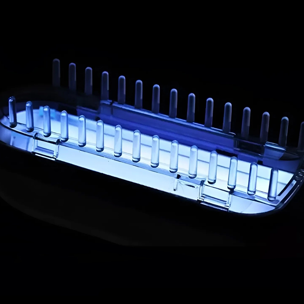 "Compact handheld UVB light therapy device for skin conditions, featuring a portable design and clear LCD display."