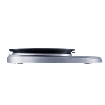 "Compact stainless steel kitchen scale with sleek design for precise 0.1g measurements, ideal for culinary accuracy."