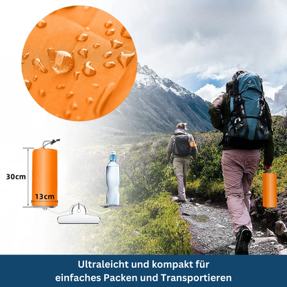 "Compact ultralight sleeping pad in Elephant Gray, perfect for camping and travel, folds small for easy packing."