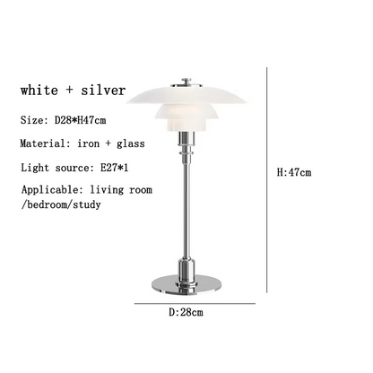 Contemporary Danish designer table lamp with warm LED light, sleek Scandinavian form, amber finish, and premium glass.