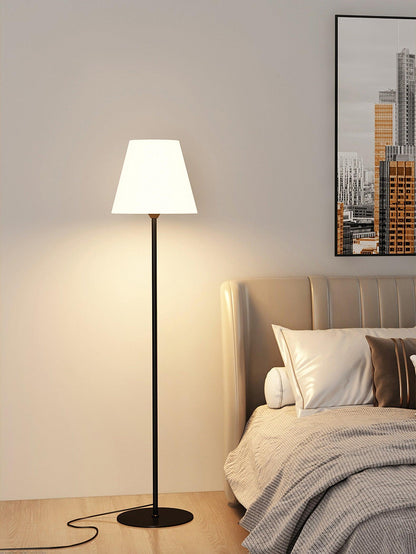 "Contemporary metal and acrylic floor-standing lamp with sleek lines, modern flair, perfect for home decor lighting."