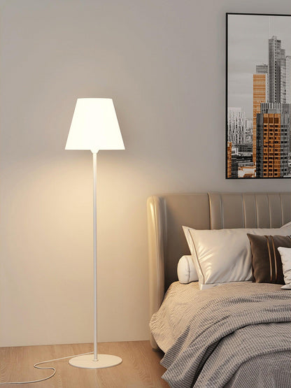 "Contemporary metal and acrylic floor-standing lamp with sleek lines, modern flair, perfect for home decor lighting."