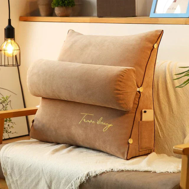 Contoured wedge pillow with ergonomic design, offering back support and a soft fabric cover for comfort and pressure relief.