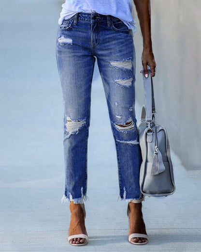 Distressed Fashionable Women's Blue Jeans