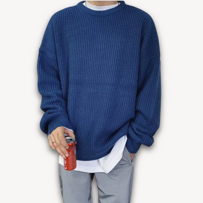 Dark green men's oversized knit sweater, soft acrylic, ribbed texture, cozy winter wear, casual elegance, warm menswear.