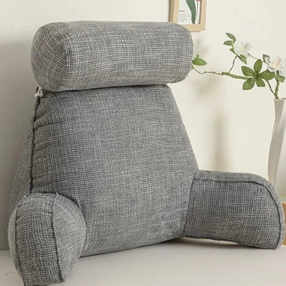 "Deluxe backrest pillow with arms and headrest in cream, featuring a soft-touch finish and side pocket for added convenience.