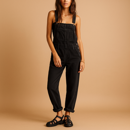 Denim dungaree for women with adjustable shoulder straps, relaxed fit, and classic design, perfect for everyday comfort and seasonal styling.