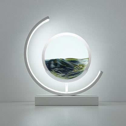"Elegant deep sea sand art with shifting sands, LED lighting in sleek frame, enhancing home decor with calming visuals."