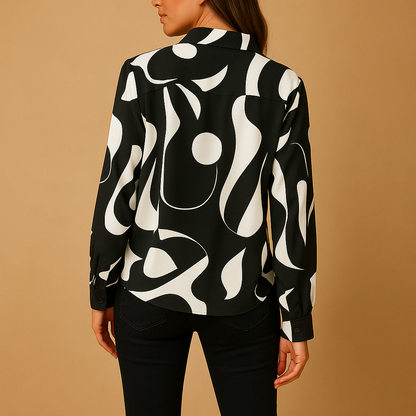 Elegant printed long sleeve blouse for women in apricot and black, with a smooth fit and refined design for casual or formal outfits.
