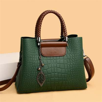 Elegant teak women's handbag with luxe design, showcasing premium craftsmanship and spacious interior in classic colors.